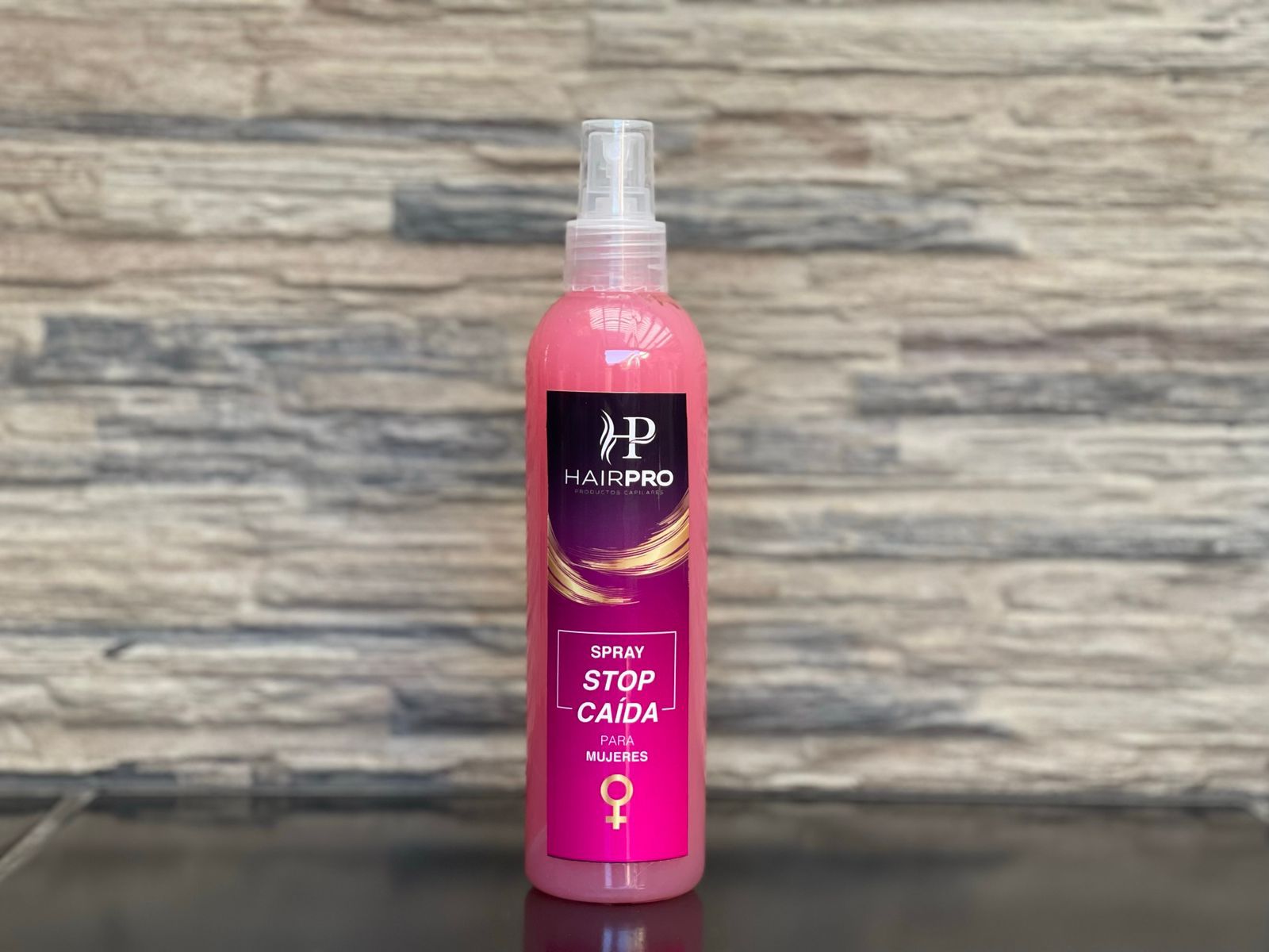 Spray stop caída mujer
